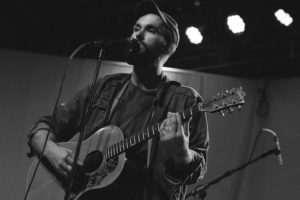 Matt performing at the songwriter community.